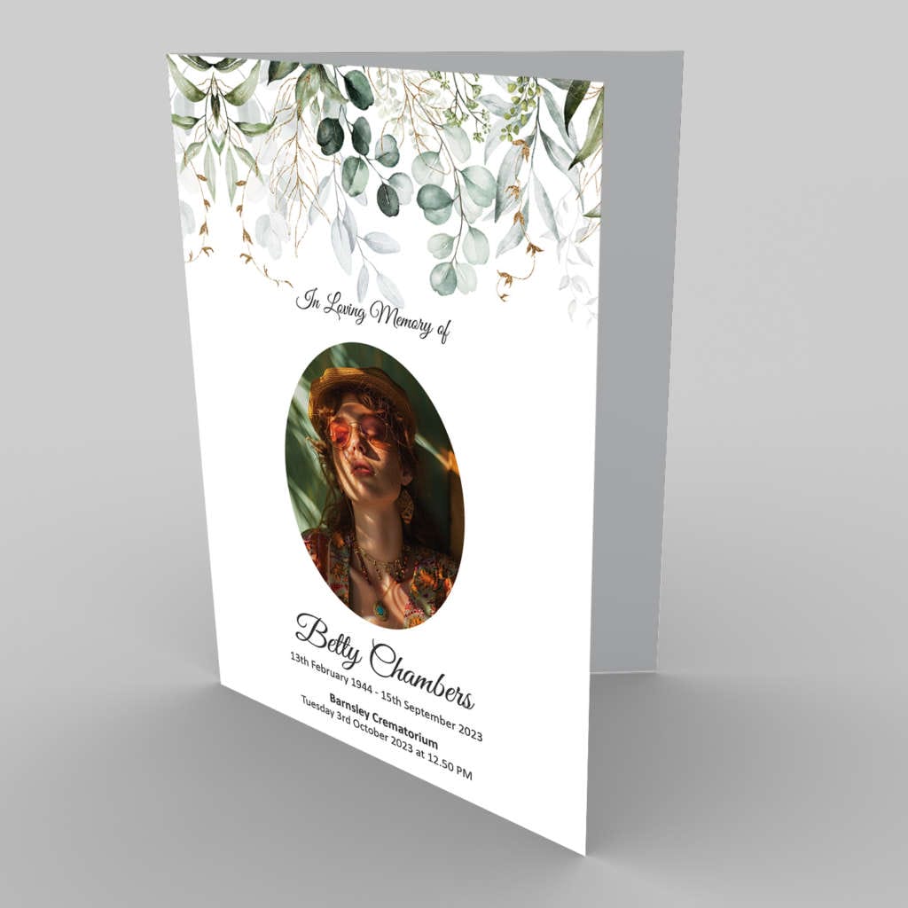 A funeral program with an image of a woman with eucalyptus leaves and 1.1 Black Ribbon (Copy).