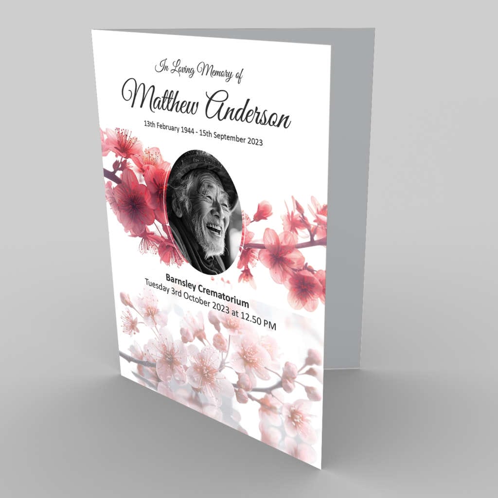 A memorial service program 7.66 Cherry Blossom 4 copy for Matthew Anderson with cherry blossom design elements.