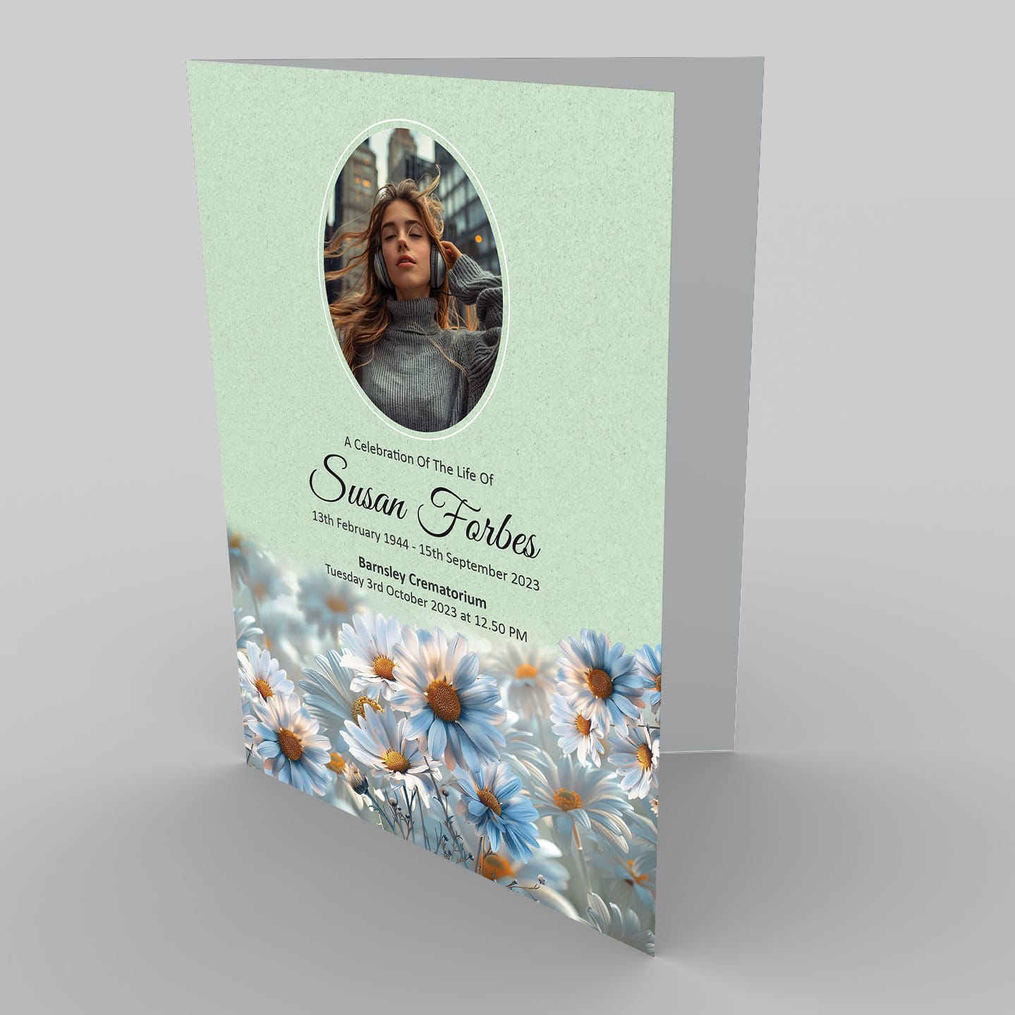 Funeral program featuring a woman's portrait and 8.1 Picture Montage (Copy) with floral design for Susan O. Forbes' memorial service.