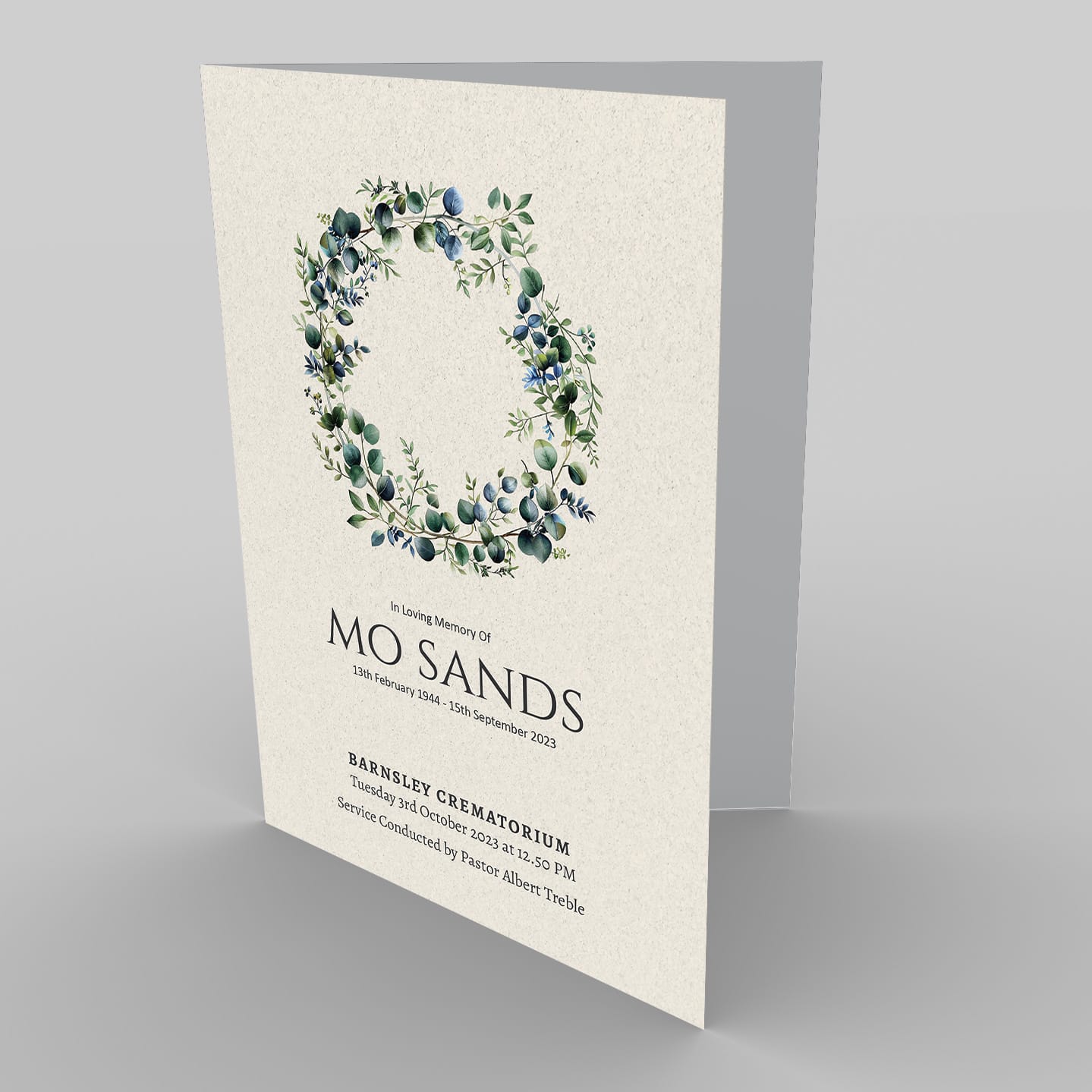 Elegant funeral program featuring a 2.1 Green Tone Wreath 5 and ceremony details.