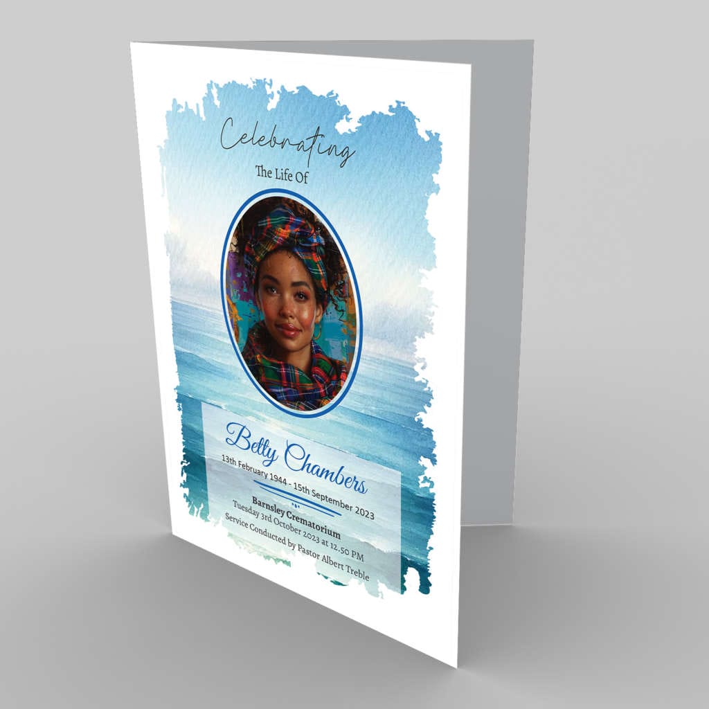 A funeral program template with an image of a woman in a blue dress against a 10.3 Seascape 2 background.